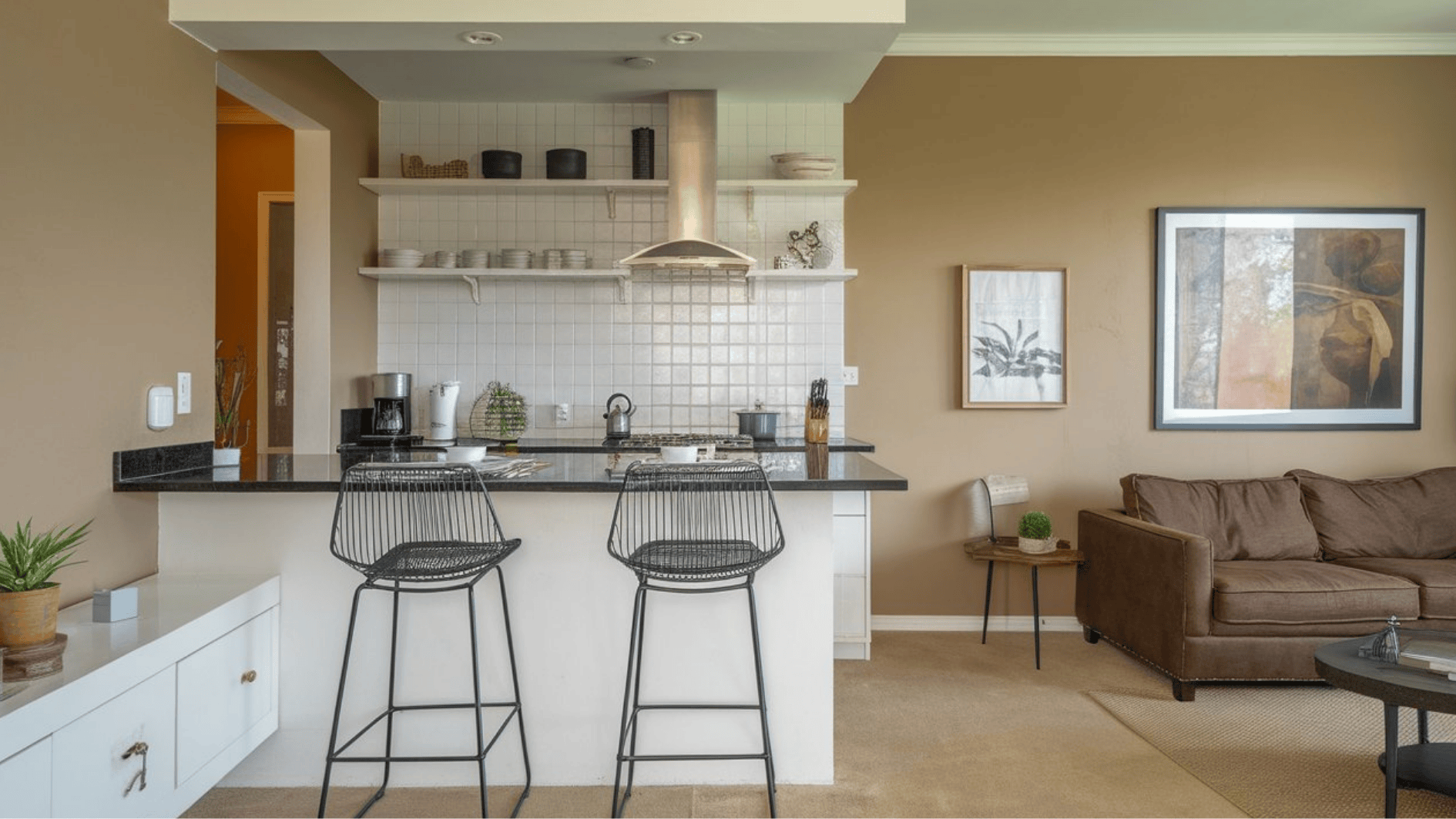 bar stool setup with connected kitchen image