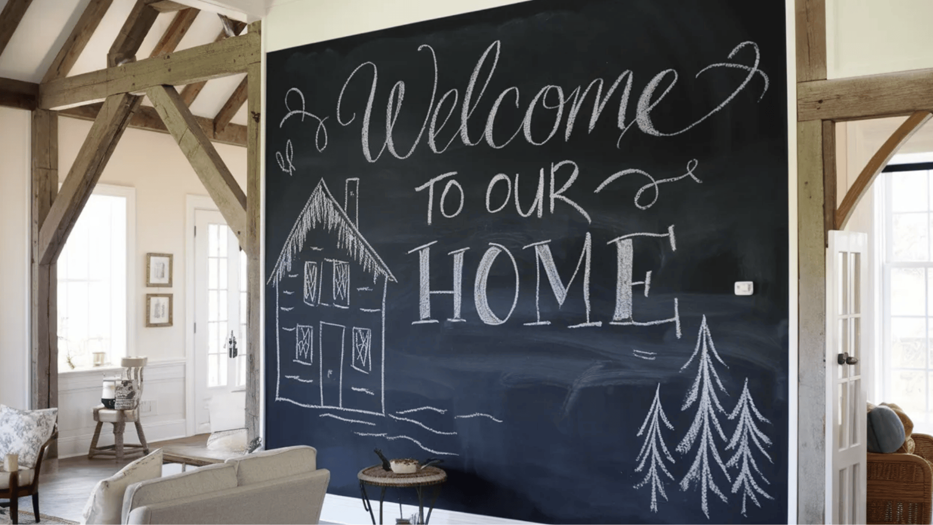 chalkboard wall with a welcoming _Welcome to Our Home_ message and house illustration, adding a personal touch to the space