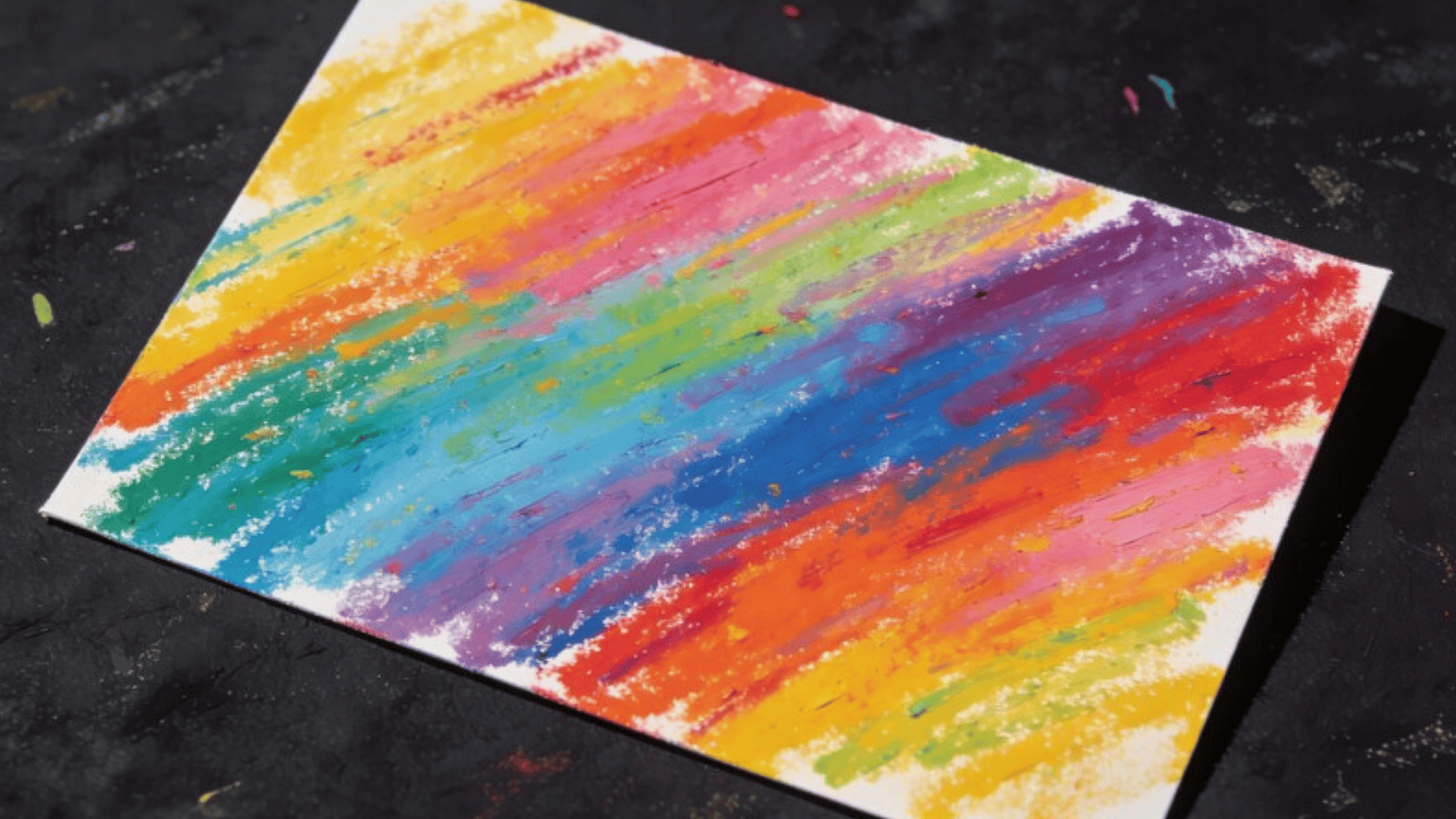 one cardstock fully colored with blended oil pastels, visible strokes and rich color transitions